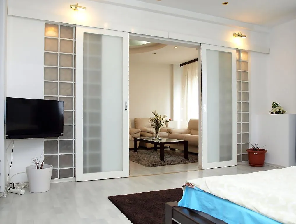 Academy Deluxe Apartments contacts
